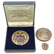 A cased three piece International Women's Year 197