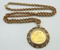 A 9ct gold mounted 1958 QEII full gold sovereign o