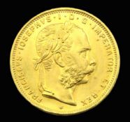 An 1892 Austrian 8fl/20fr Franz Joesph I gold coin