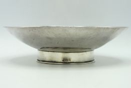 A stylised sterling silver footed bowl with lightl