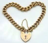 A 9ct gold curb link bracelet with padlock, 21.9g,