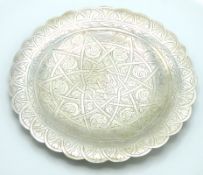 An Islamic silver dish, 148mm diameter, 73.5g