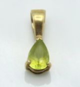 A 9ct gold Magara chrysoberyl pendant, 0.5g, 13mm