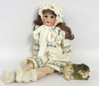 A German Heubach Koppelsdorf doll with porcelain h