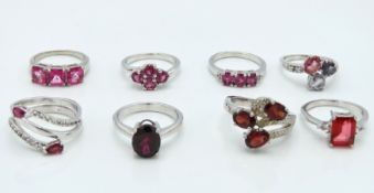 Eight sterling silver rings set with various stone