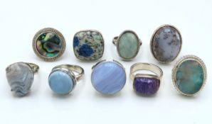 Nine sterling silver rings set with various stones