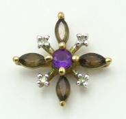 A 9ct gold pendant set with diamond, amethyst & sm