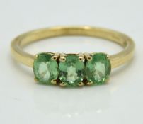 A 10ct gold ring set with green topaz, 2g, size O