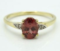 A 10ct gold ring set with pink apatite & diamond,