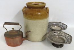A 19thC. copper kettle twinned with a stoneware ja