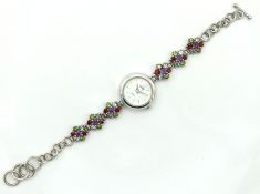 A ladies sterling silver wristwatch set with blue