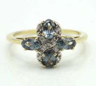A 10ct gold ring set with possibly paraiba garnet