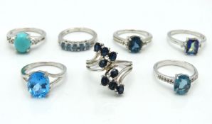 Seven sterling silver rings set with various stone