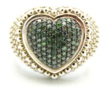 A sterling silver cluster ring set with 1ct of gre