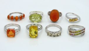 Eight sterling silver rings with various stones in