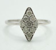 A 10ct white gold ring set with approx. 0.45ct of