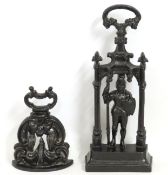 Two cast iron doorstops, tallest 439mm