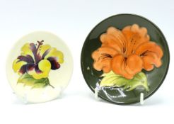 A small Moorcroft pottery footed bowl with a yello