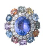 Bague en or blanc ornée au centre d'une Tanzanite bleue et de saphirs