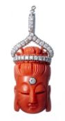 Tête de bouddha en corail et diamants