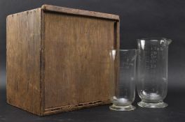 TWO 20TH CENTURY BOXED ETCHED GLASS PHARMACY BEAKERS