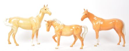 BESWICK - COLLECTION OF THREE 20TH CENTURY CHINA PALOMINO HORSE FIGURINES
