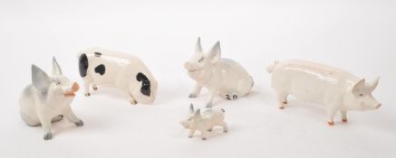 BESWICK - COLLECTION OF FIVE 20TH CENTURY PORCELAIN PIG FIGURINES