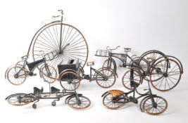 COLLECTION OF CAST METAL VINTAGE 20TH CENTURY SHOP BIKES