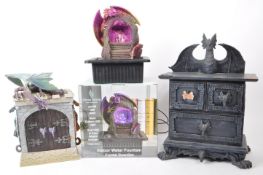 COLLECTION OF THREE CONTEMPORARY DRAGON-RELATED DECORATIVE PIECES