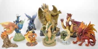 COLLECTION OF NINE CONTEMPORARY RESIN DRAGON FIGURES