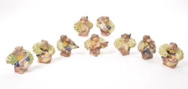 BESWICK - COLLECTION OF NINE 1950S PORCELAIN MONKEY BAND FIGURINES