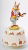 ROYAL DOULTON - BUNNYKINS - 20TH CENTURY PORCELAIN 'HEY JUDE' MUSIC BOX
