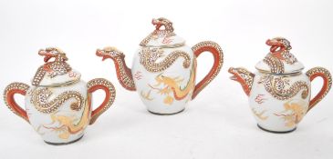 THREE VINTAGE 20TH CENTURY JAPANESE DRAGON TEAPOTS