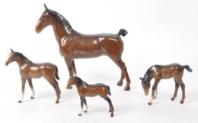 BESWICK - A 20TH CENTURY HACKNEY HORSE AND THREE FOALS