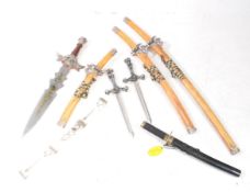 COLLECTION OF EIGHT CONTEMPORARY REPLICA DRAGON-THEMED SWORDS