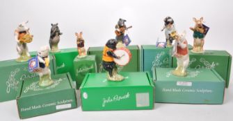 BESWICK - COLLECTION OF NINE 1990S CERAMIC 'PIG PROMENADE' FIGURINES