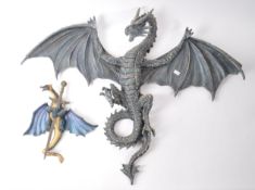 TWO CONTEMPORARY RESIN DRAGON WALL-HANGING FIGURES