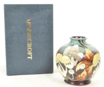 MOORCROFT POTTERY - 21ST CENTURY 2011 LIONSHIELD PATTERN VASE