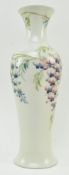 WILLIAM MOORCROFT FOR LIBERTY & CO - TUBE LINED CERAMIC WISTERIA VASE