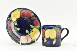 WILLIAM MOORCROFT - WISTERIA - EARLY 20TH CENTURY CERAMIC COFFEE CUP & SAUCER