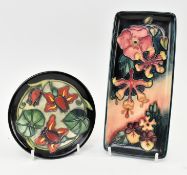 MOORCROFT POTTERY - TWO 20TH CENTURY TUBE LINED TRINKET / PEN DISHES