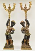PAIR OF CARVED BLACKAMOOR FIGURES DESIGNED AS FOUR BRANCH WOODEN CANDELABRAS