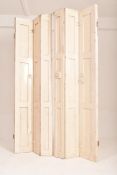 MATCHING PAIR OF 19TH CENTURY WHITE PAINTED WINDOW BIFOLD SHUTTERS