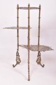 19TH CENTURY PIERCED BRASS DECORATIVE THREE TIER PLANT STAND