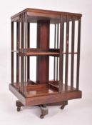 EDWARDIAN MAHOGANY REVOLVING PEDESTAL BOOKCASE