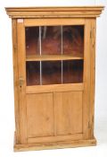 EARLY 20TH CENTURY GLAZED PINE CUPBOARD