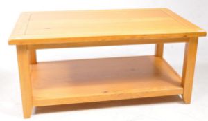 MANNER OF OAK FURNITURE LAND - MODERN OAK COFFEE TABLE