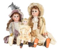 DOLLS - TWO 20TH CENTURY BISQUE HEADED DOLLS