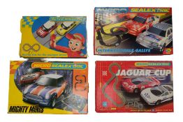 SCALEXTRIC - FOUR MICRO SCALEXTRIC SLOT CAR RACING SETS