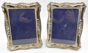 PAIR OF ELIZABETH II HALLMARKED SILVER PHOTOGRAPH FRAMES